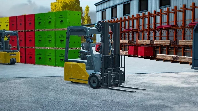 A digital rendering of a yellow and black forklift in a virtual reality setting, positioned on a concrete floor. The forklift is depicted with its fork arms lowered, situated in front of a warehouse with stacks of green and red pallets visible in the background, suggesting an industrial or logistical training scenario
